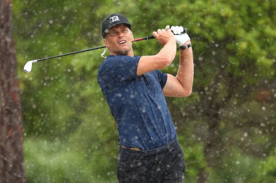 NFL star Tom Brady playing golf during 'The Match'