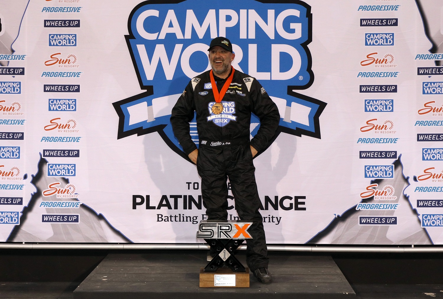 SRX driver Tony Stewart celebrates after winning the Camping World Superstar Racing Experience event at Knoxville Raceway on June 19, 2021.