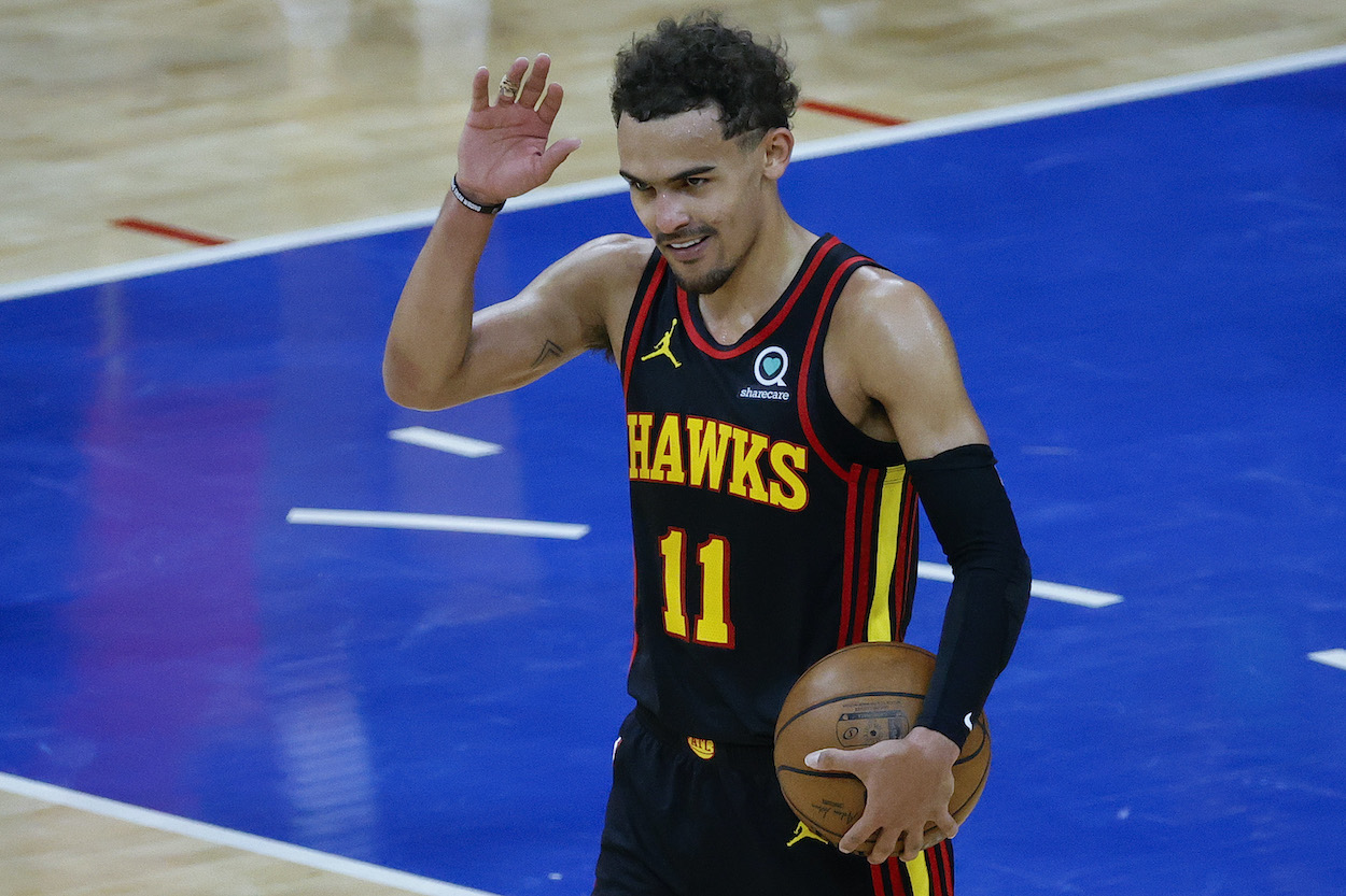 Trae Young of the Atlanta Hawks celebrates after defeating the Philadelphia 76ers during Game Seven of the Eastern Conference Semifinals. After the game, Trae Young's dad got a special Father's Day gift from his son.