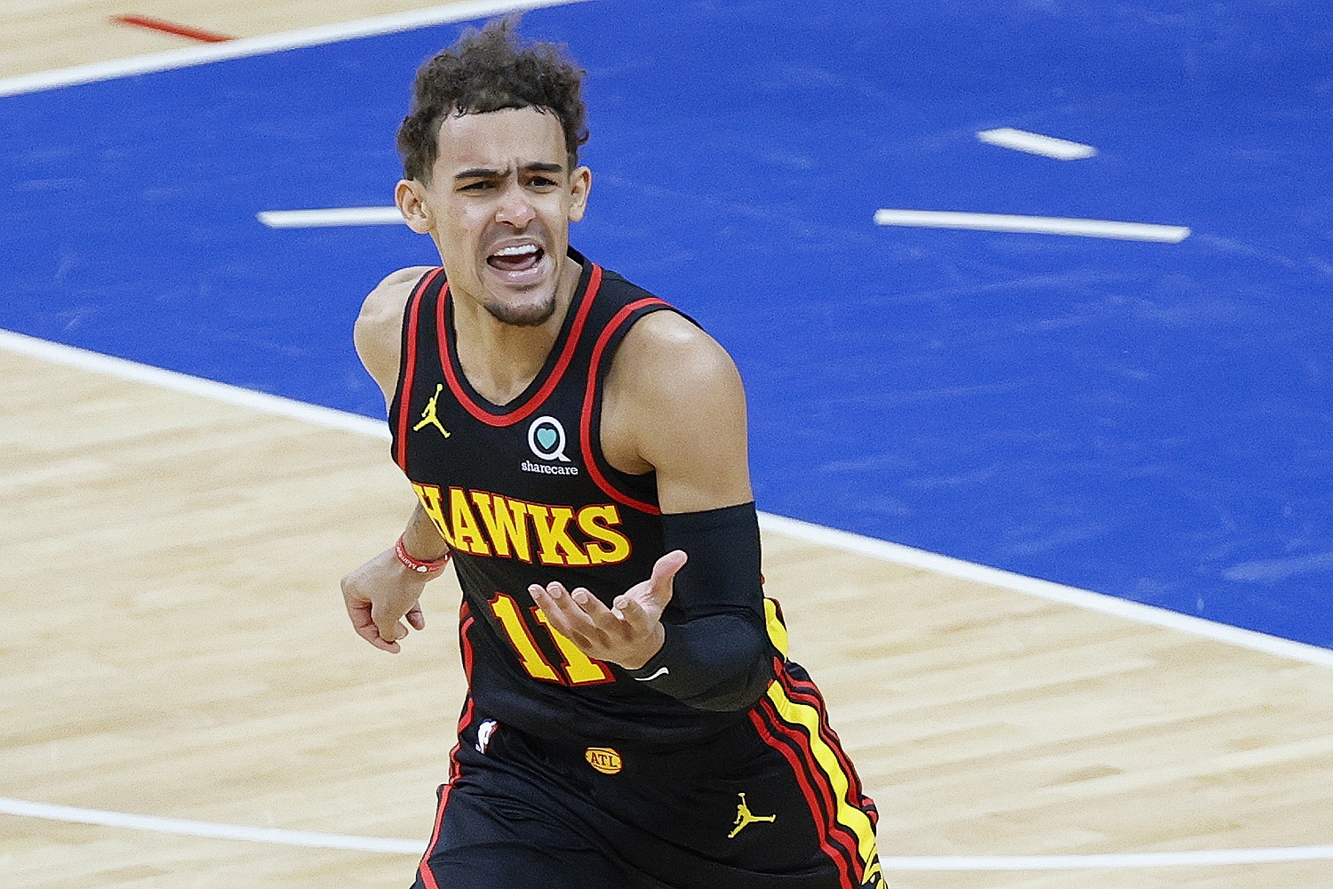 Trae Young of the Atlanta Hawks reacts during the second quarter against the Philadelphia 76ers during Game 1 of the Eastern Conference semifinals on June 6, 2021.