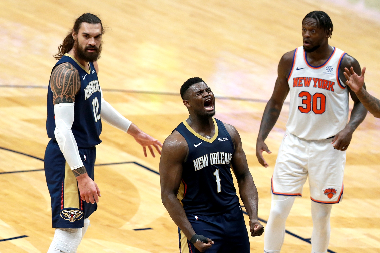 Pelicans forward Zion Williamson celebrates scoring a basket.