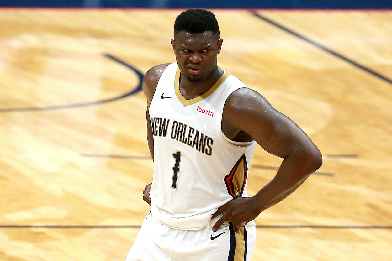 Zion Williamson of the New Orleans Pelicans stands on the court during the fourth quarter of an NBA game against the Sacramento Kings at Smoothie King Center on April 12, 2021 in New Orleans, Louisiana.