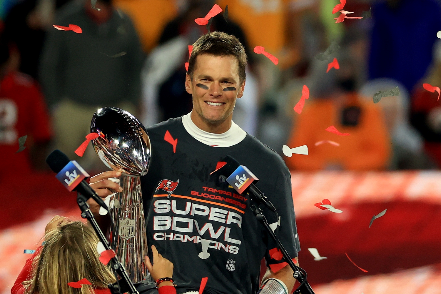 Tom Brady holds the Lombardi Trophy after Super Bowl 55.