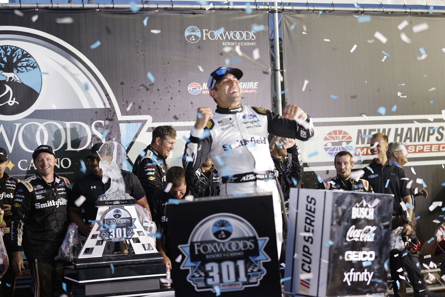 Aric Almirola, driver of the No. 10 Ford for Stewart-Haas Racing,  celebrates winning the Foxwoods Resort Casino 301 on July 18, 2021, at New Hampshire Motor Speedway. | Fred Kfoury III/Icon Sportswire via Getty Images