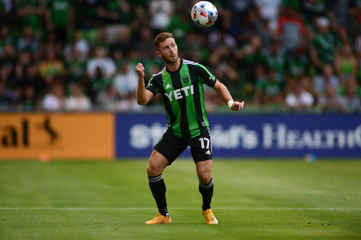 Austin FC forward Jon Gallagher heads ball