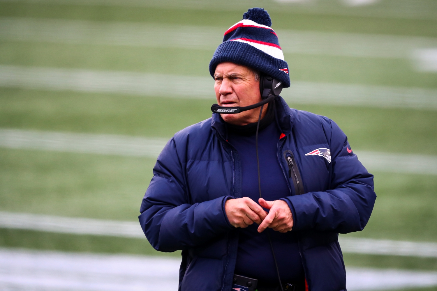 New England Patriots coach Bill Belichick looks on during a game.