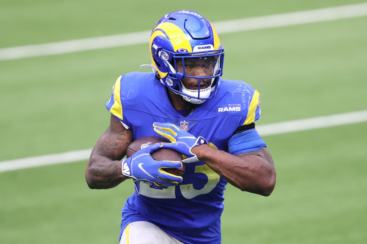 Cam Akers of the Los Angeles Rams rushes with the ball during the first half of a game against the Arizona Cardinals at SoFi Stadium on January 03, 2021 in Inglewood, California.