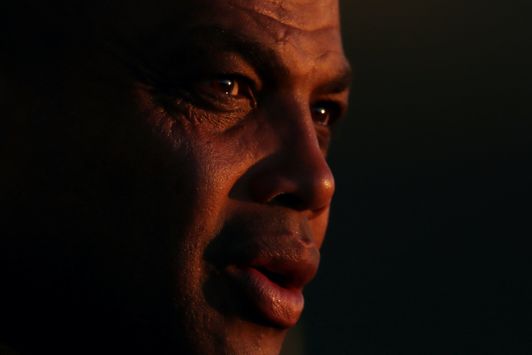 TNT's Charles Barkley watches the action during The Match.