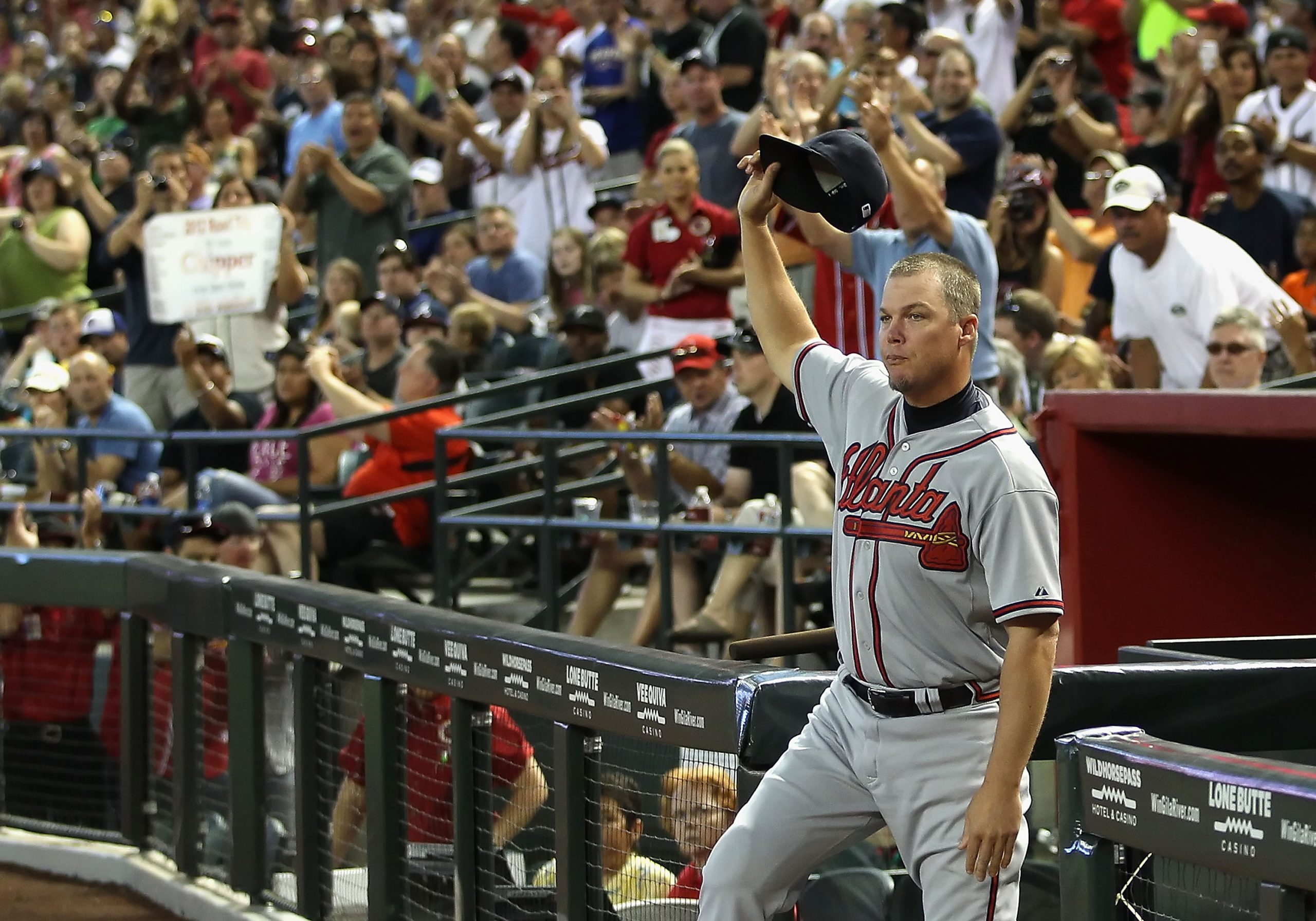 Atlanta Braves infielder Chipper Jones, left, jokes with former