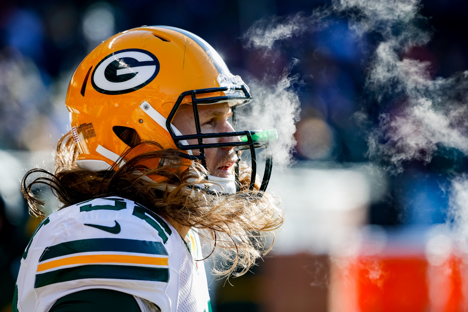 Green Bay Packers linebacker Clay Matthews stands on the field during a game against the Chicago Bears.