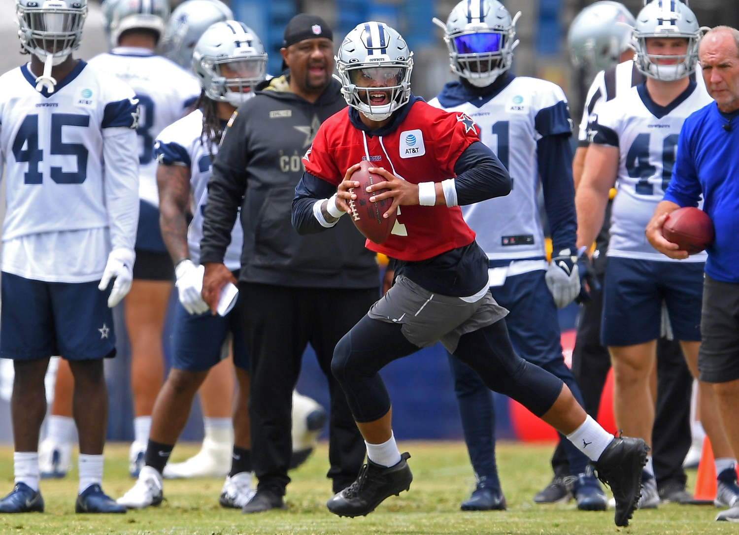 Dallas Cowboys quarterback Dak Prescott readies to pass the ball during training camp practice.