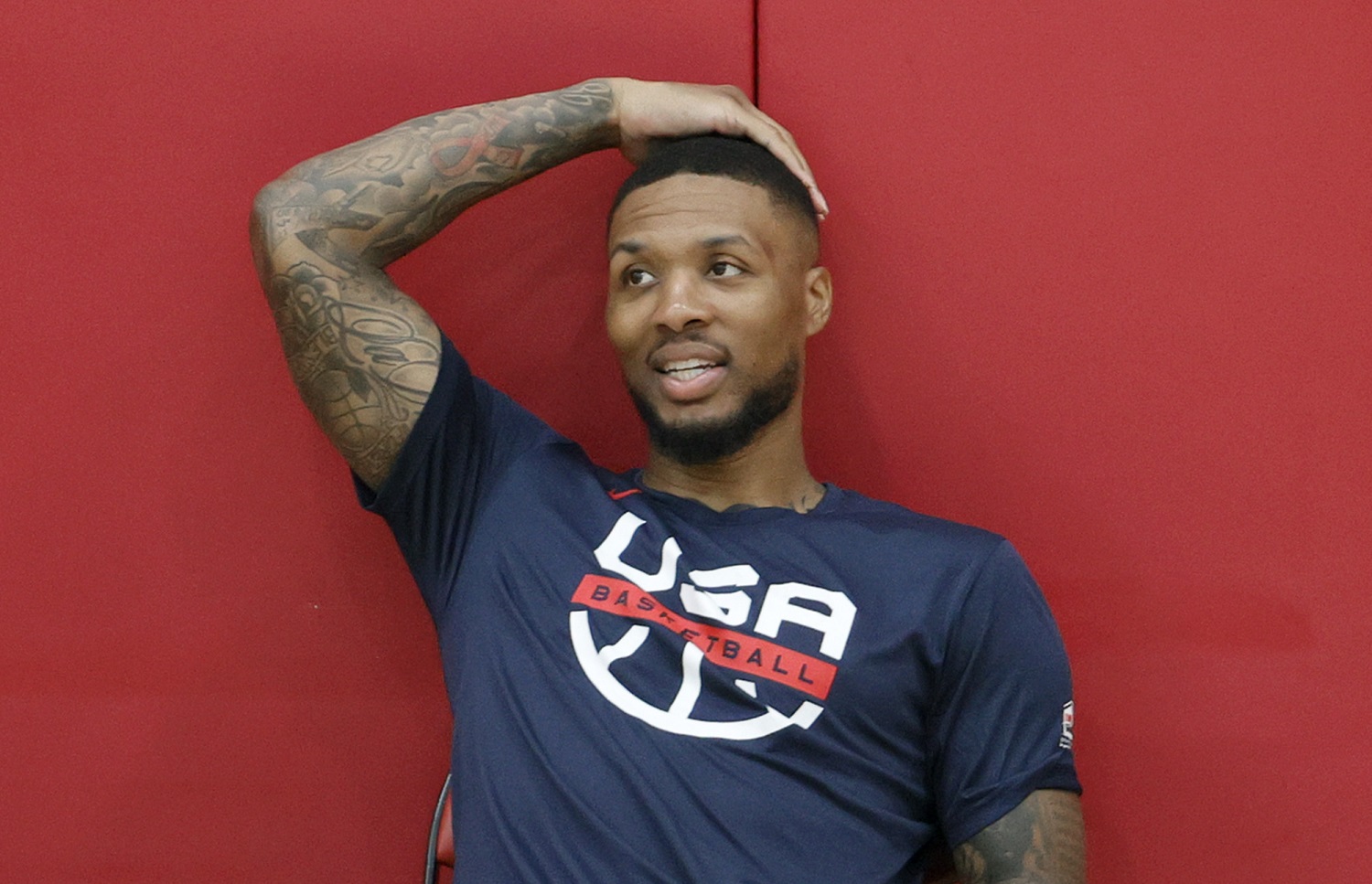 Damian Lillard of the 2021 USA Basketball Men's National Team rests after a practice at UNLV as the team gets ready for the Tokyo Olympics| Ethan Miller/Getty Images