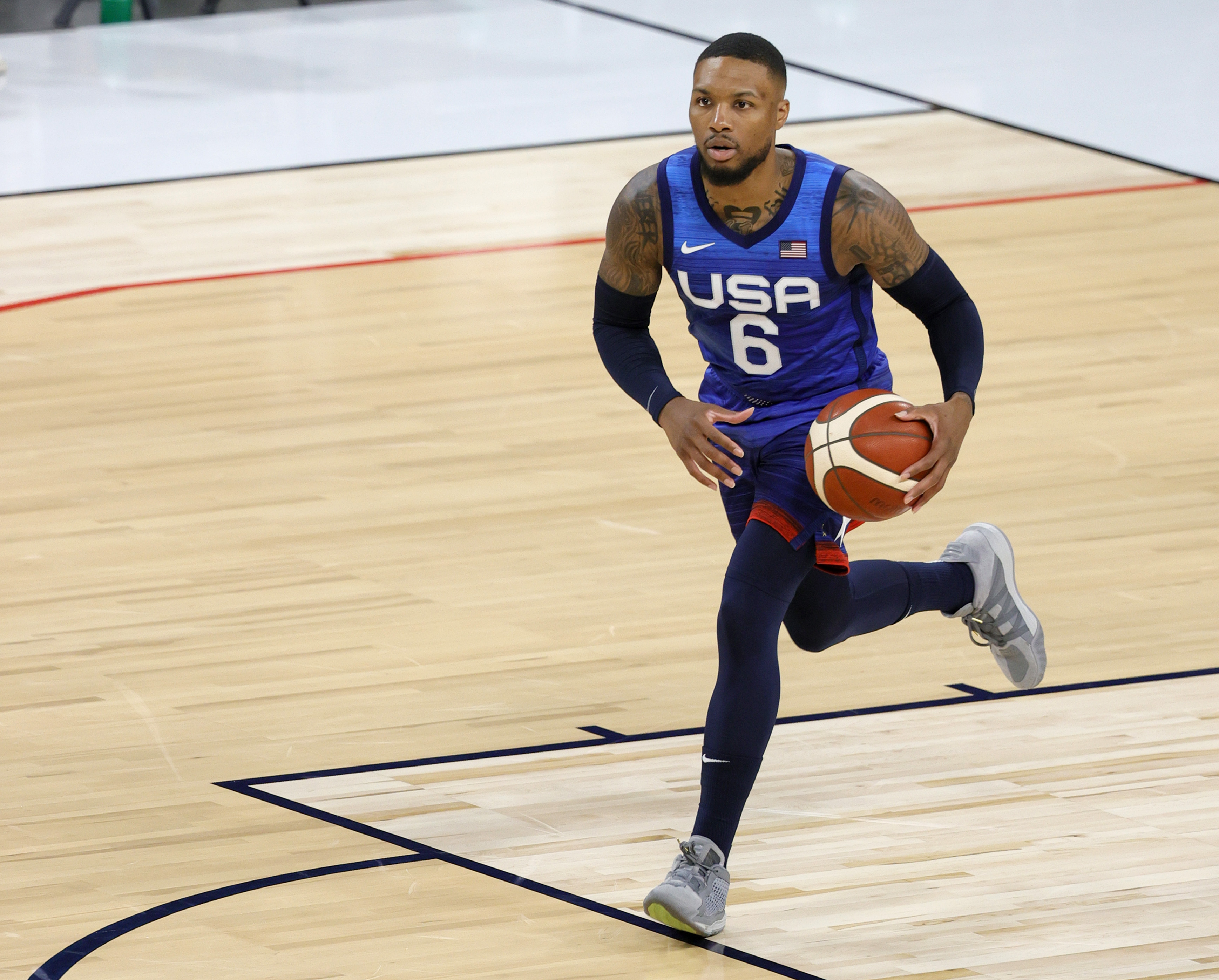 Damian Lillard dribbles up the floor during Team USA's exhibition game against Australia.