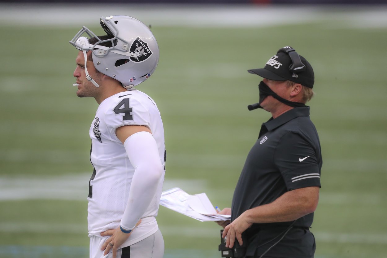 Las Vegas Raiders quarterback Derek Carr (4) and Raiders head coach Jon Gruden.