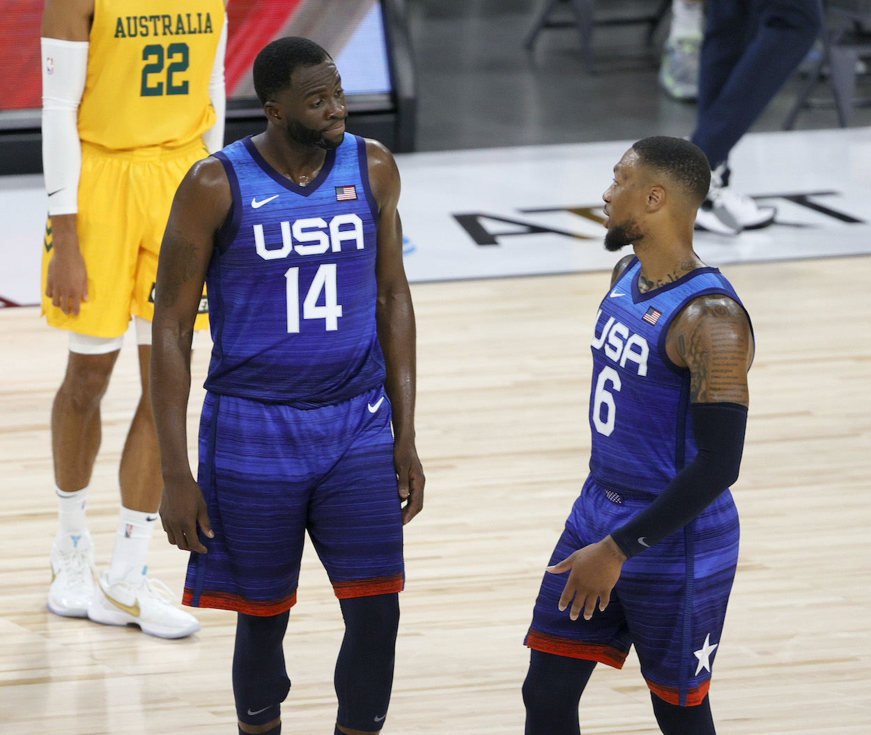 Draymond Green and Damian Lillard of Team USA talk during an exhibition game against the Australia Boomers at Michelob Ultra Arena ahead of the Tokyo Olympic Games on July 12, 2021 in Las Vegas, Nevada. Australia defeated the United States 91-83.