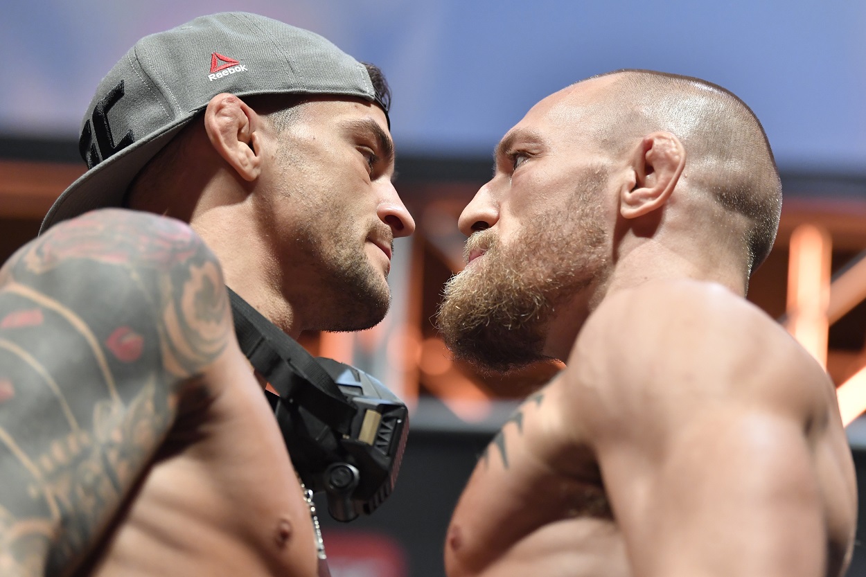 Dustin Poirier and Conor McGregor at the weigh-in ahead of their fight at UFC 257