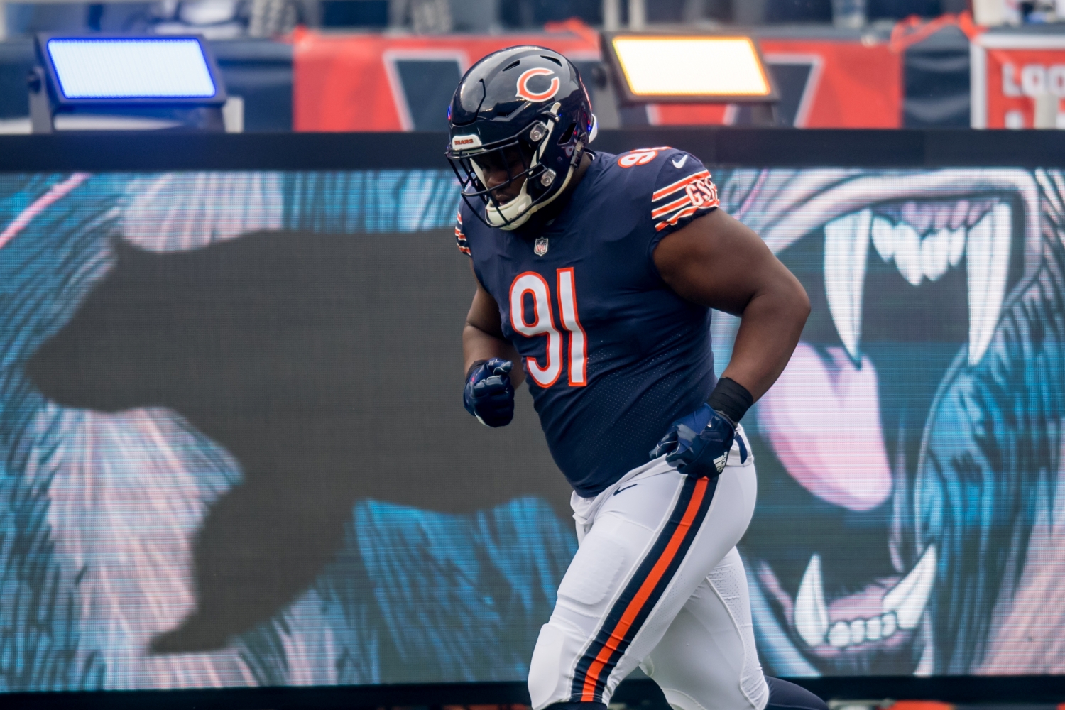 Chicago Bears defensive tackle Eddie Goldman jogs onto the field.