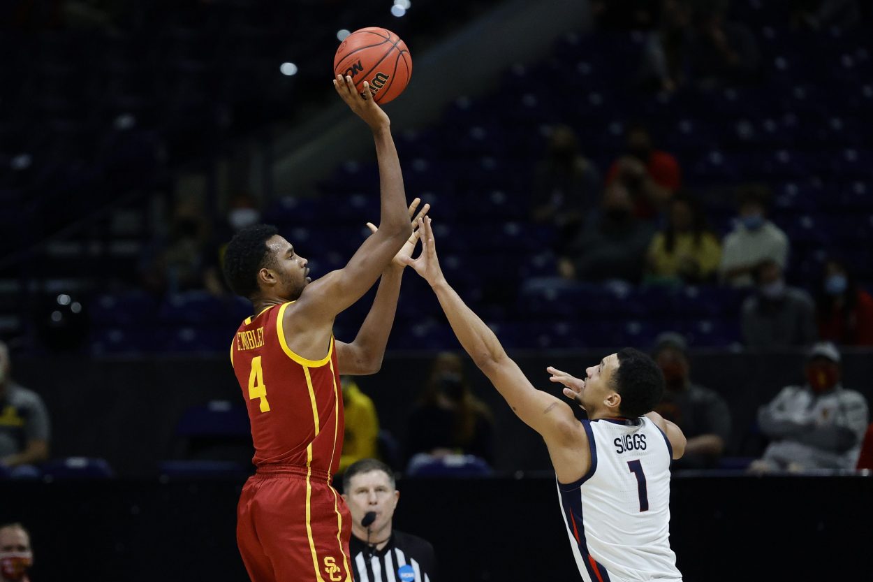 NBA draft prospect Evan Mobley shoots over fellow draft hopeful Jalen Suggs during the Elite 8