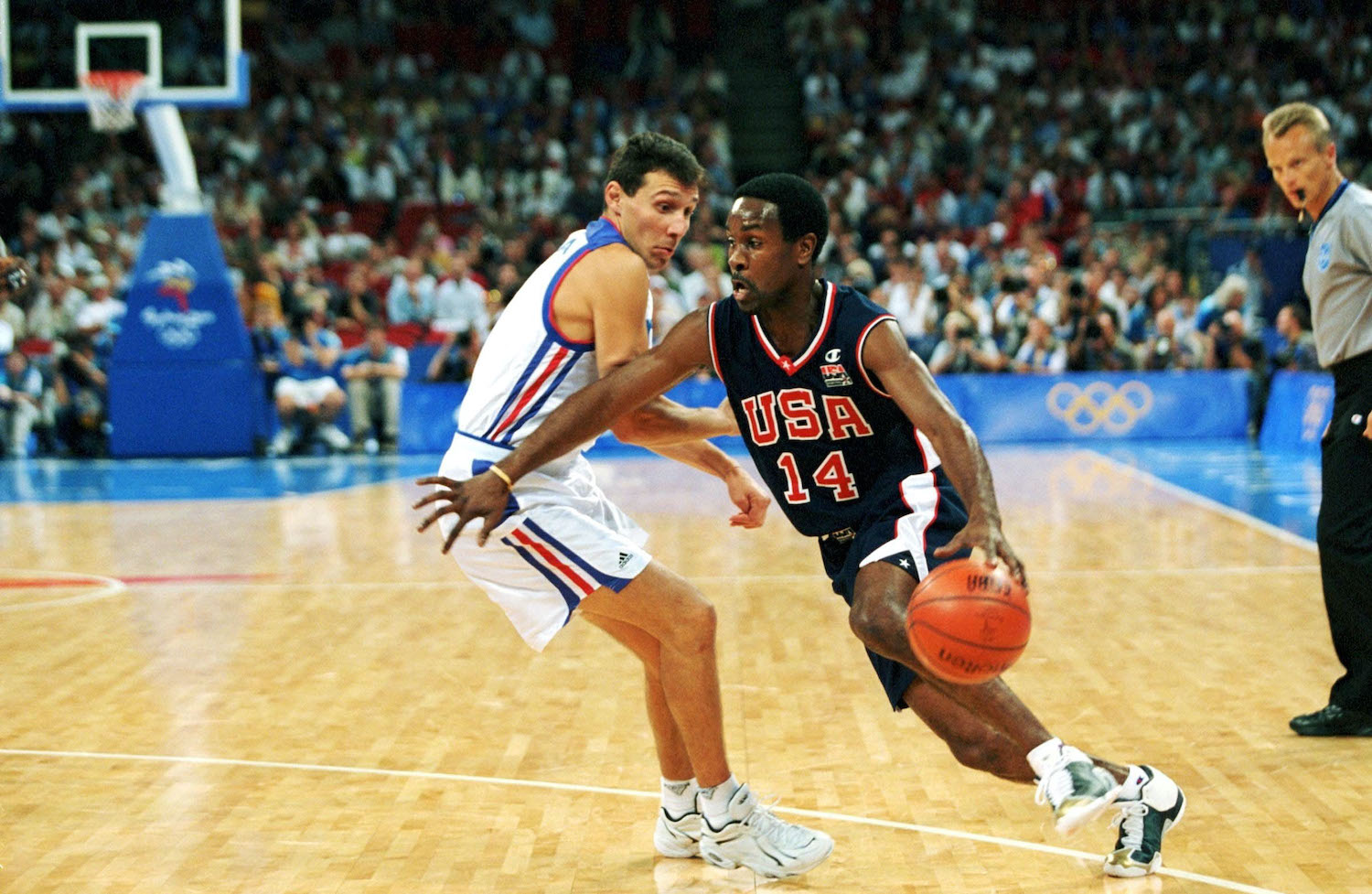 Gary Payton drives by a defender as a member of Team USA.