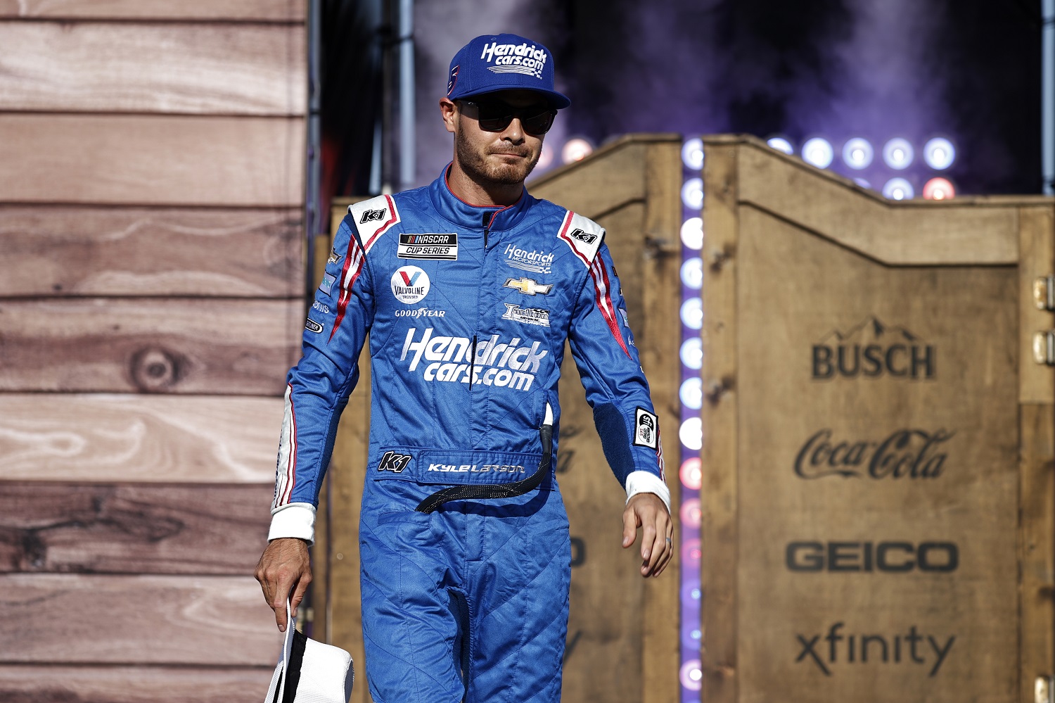 Kyle Larson walks onstage during driver introductions prior to the NASCAR All-Star Race at Texas Motor Speedway on June 13, 2021. | Chris Graythen/Getty Images