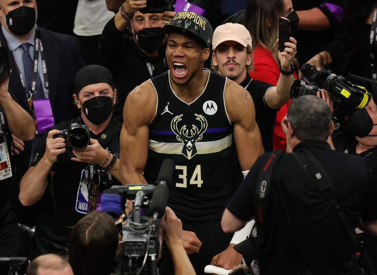 Giannis Antetokounmpo celebrates the Milwaukee Bucks' first NBA championship in 50 years