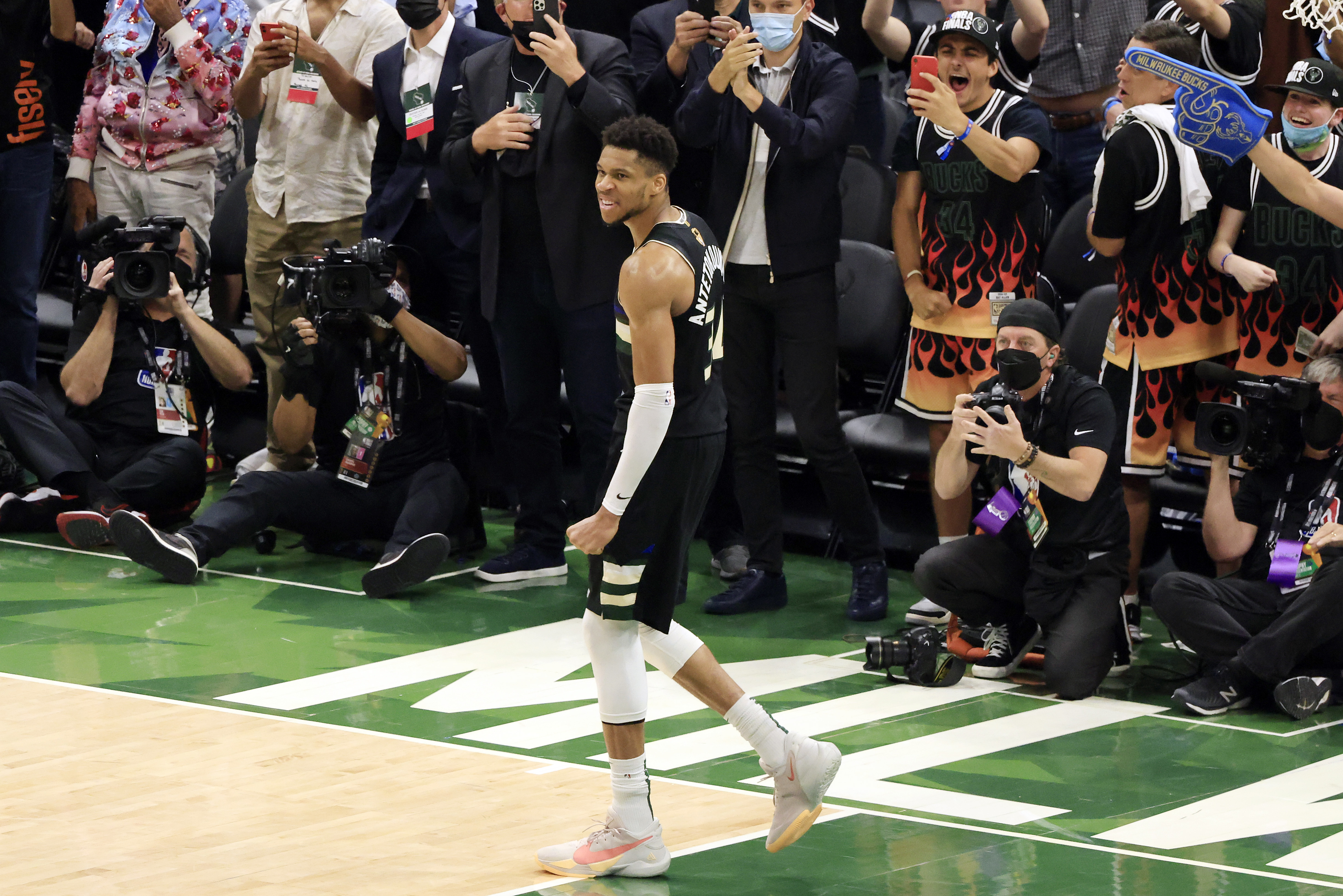 Milwaukee Bucks star Giannis Antetokounmpo reacts during the closing seconds of Game 6 of the NBA Finals