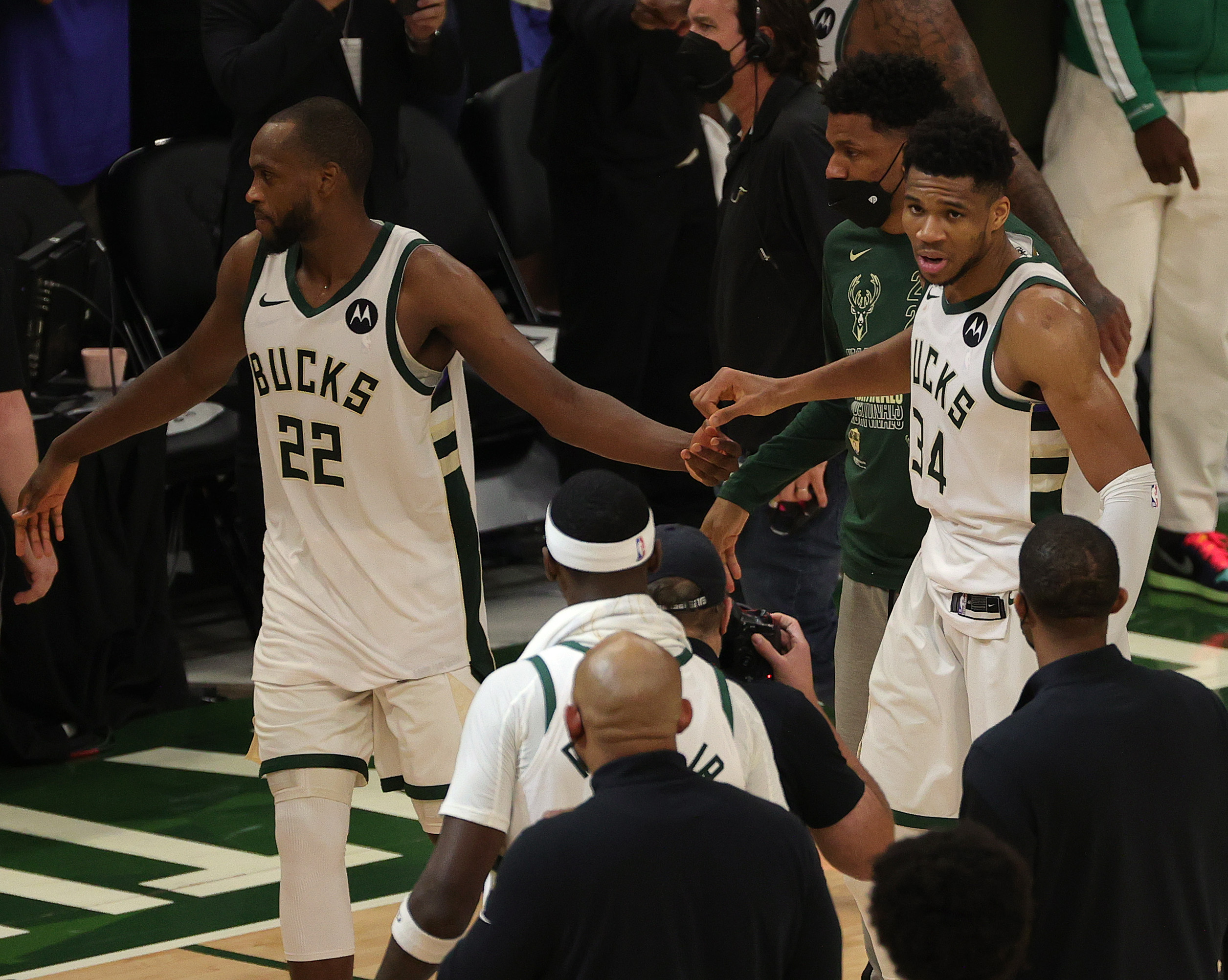 Giannis Antetokounmpo and Khris Middleton celebrate the Milwaukee Bucks' win in Game 4 of the NBA FInals