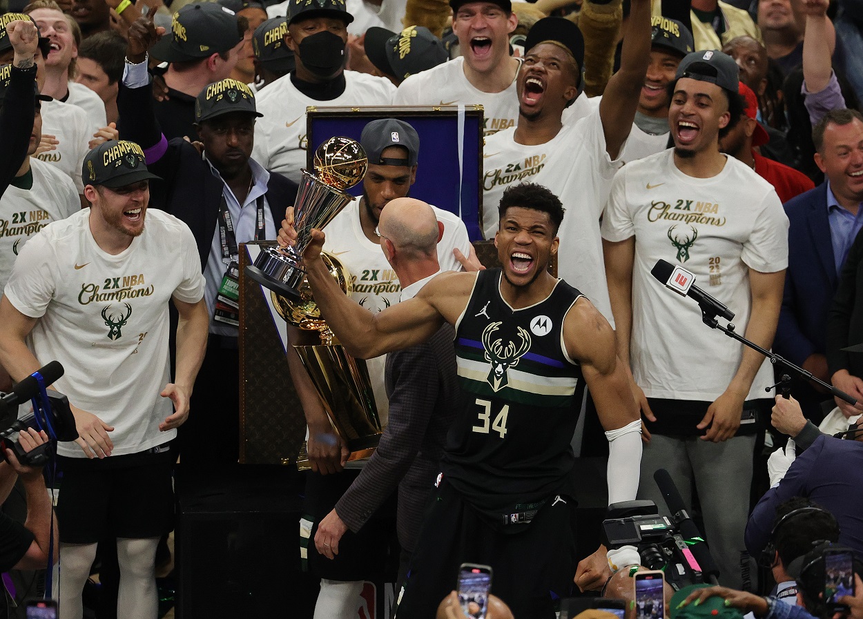 Giannis Antetokounmpo and the Milwaukee Bucks celebrate after defeating the Phoenix Suns in the 2021 NBA Finals