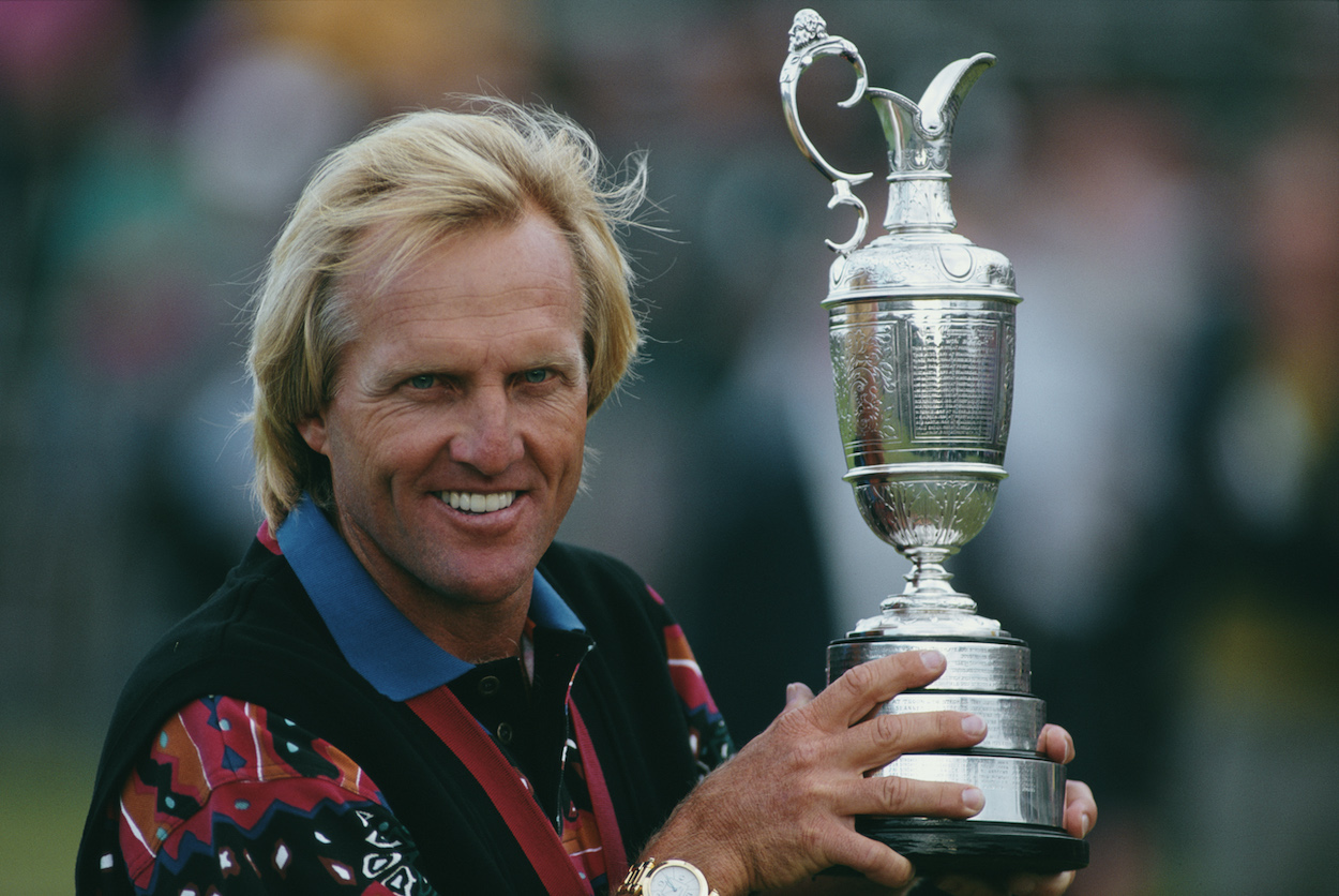 Greg Norman of Australia holds the Claret Jug after winning the 122nd Open Championship on 18th July 1993 at the Royal St George's Golf Club in Sandwich, United Kingdom.