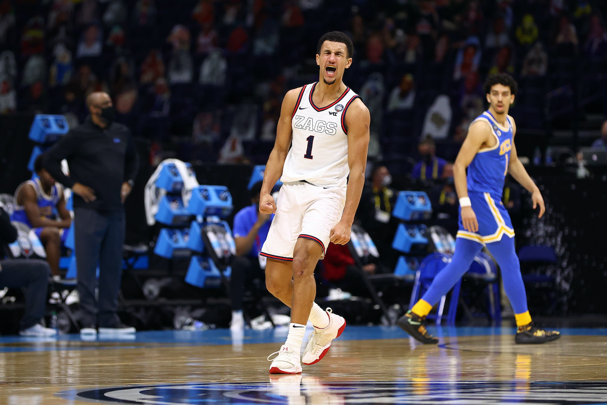 Jalen Suggs of the Gonzaga Bulldogs reacts as the game against the UCLA Bruins goes to overtime in the Final Four semifinal game of the 2021 NCAA Men's Basketball Tournament at Lucas Oil Stadium on April 03, 2021 in Indianapolis, Indiana.