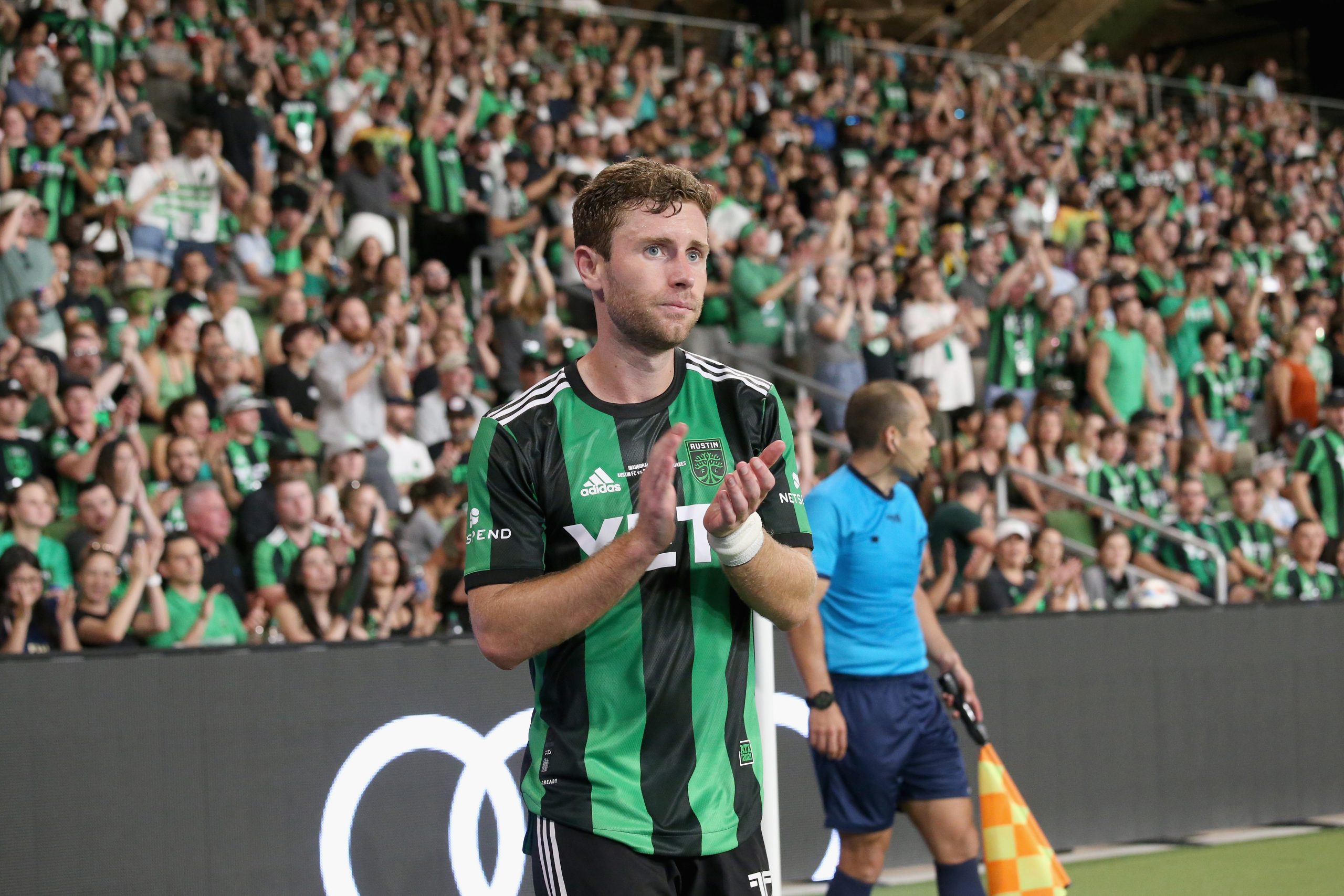 Jon Gallagher claps at Austin FC game