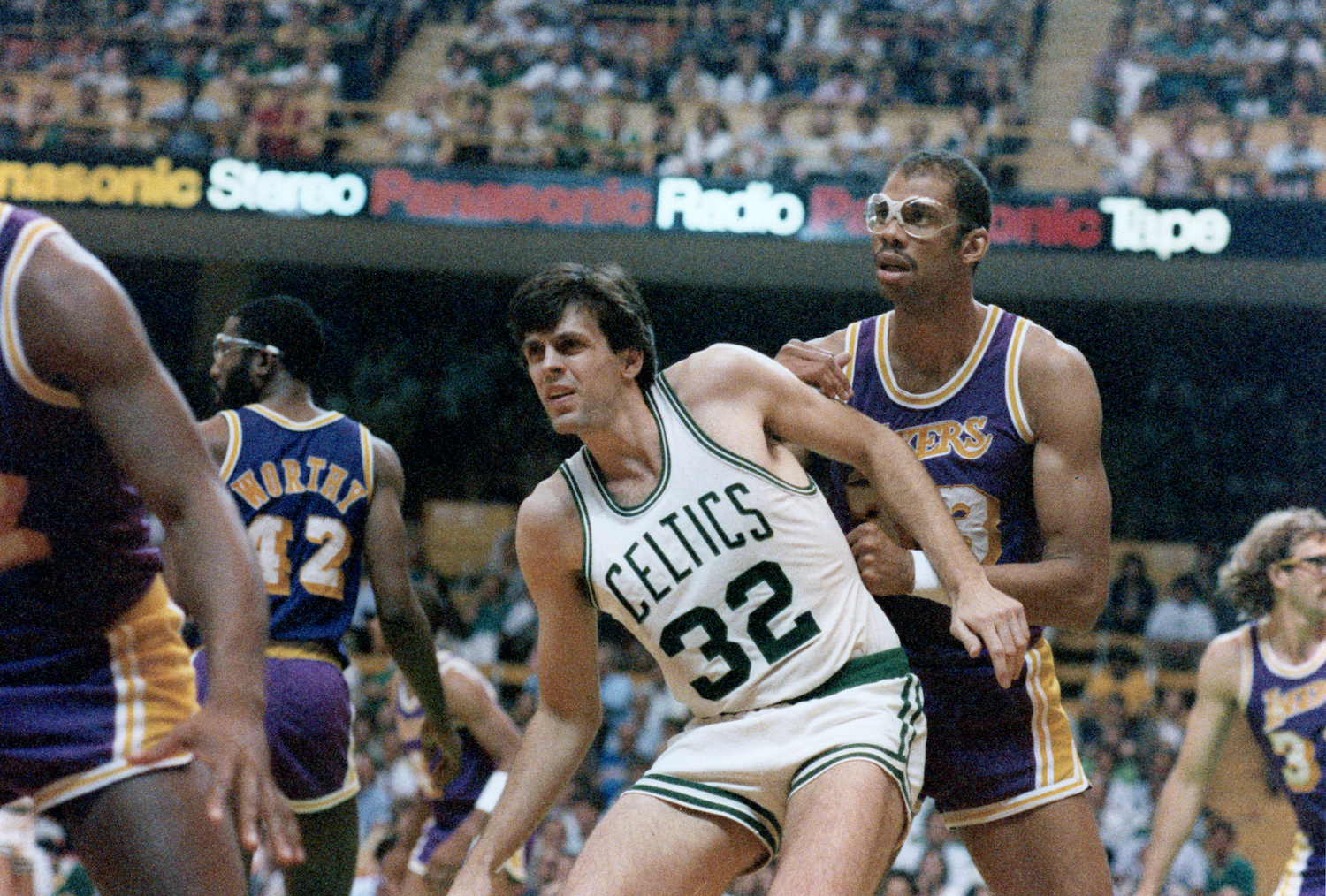 Boston Celtics forward Kevin McHale attempts to defend Kareem Abdul-Jabbar in the low post.