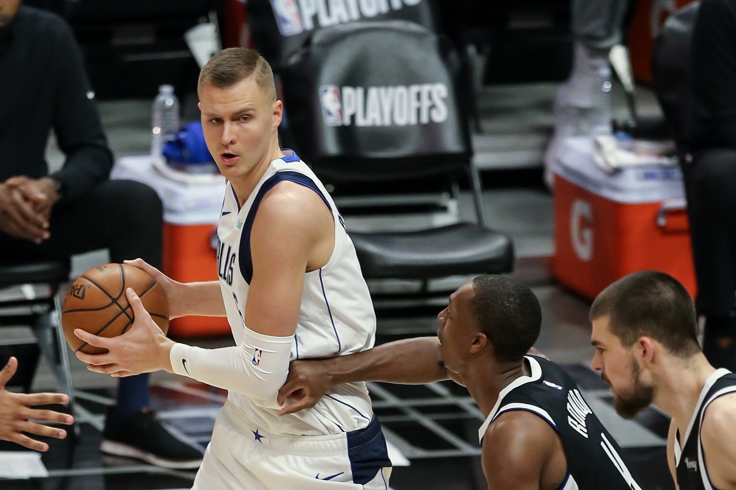 Dallas Mavericks center Kristaps Porzingis handles the ball in the post in Game 5 of the first round of the NBA Western Conference playoffs against the Los Angeles Clippers at Staples Center. | Jevone Moore/Icon Sportswire via Getty Images