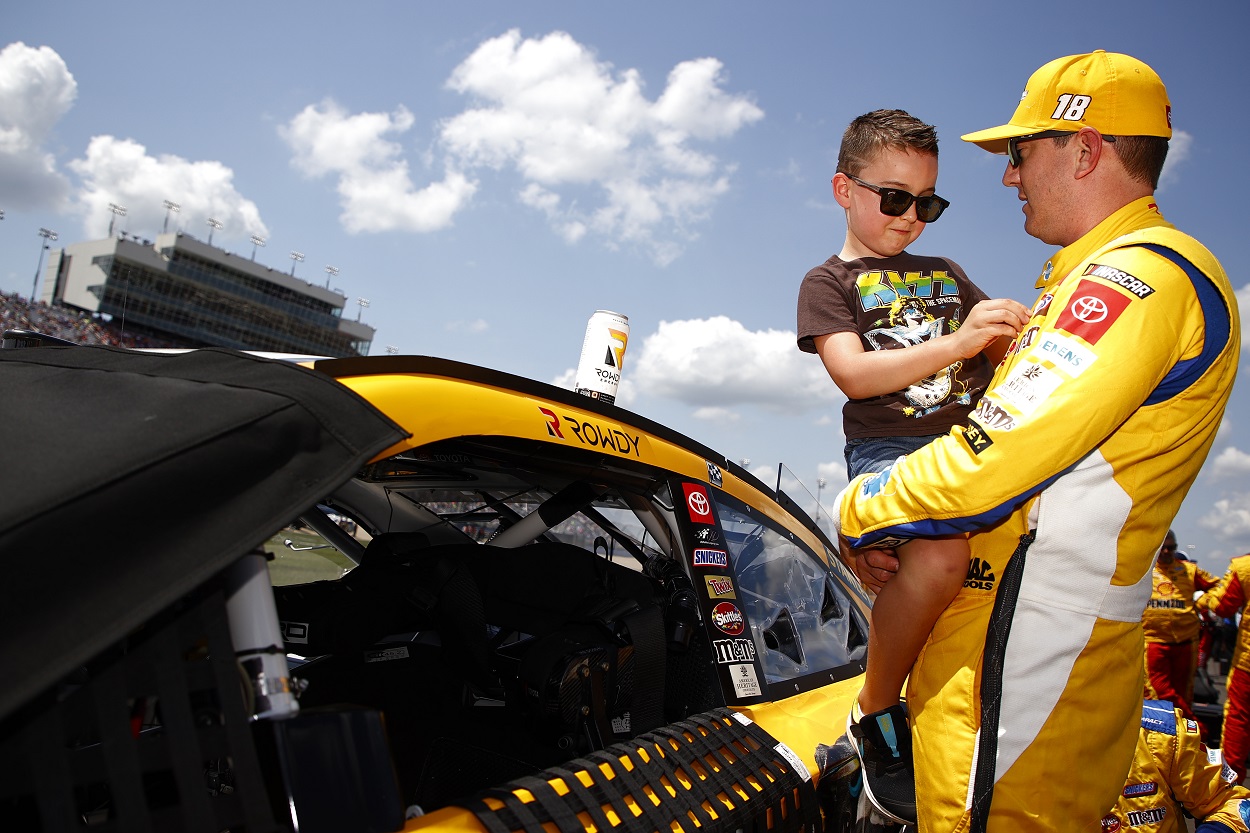 Kyle Busch with his son, Brexton, ahead of the 2021 NASCAR Cup Series Ally 400 at Nashville Superspeedway