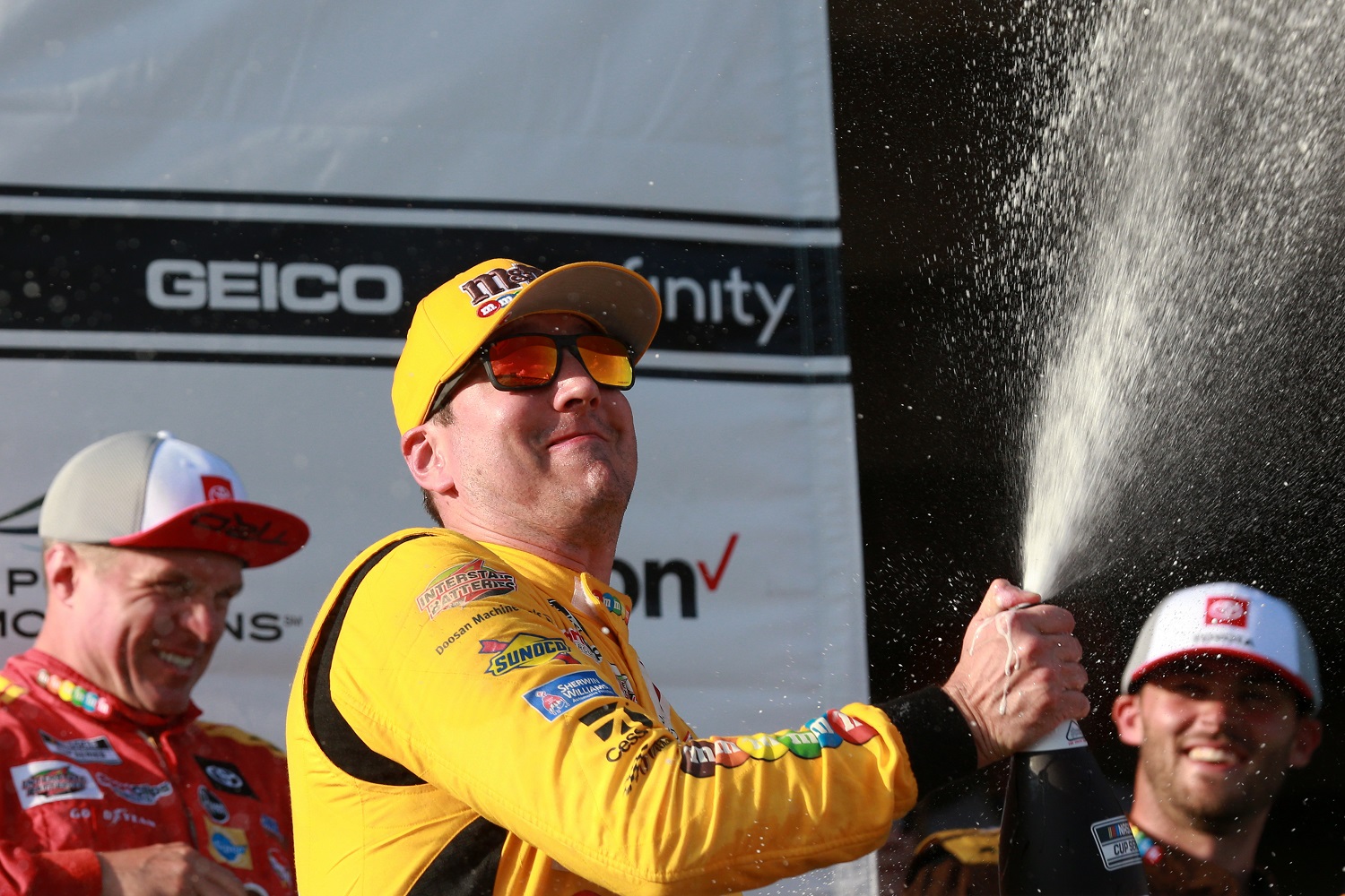 Kyle Busch celebrates in victory lane after winning the NASCAR Cup Series Explore the Pocono Mountains 350 on June 27, 2021.