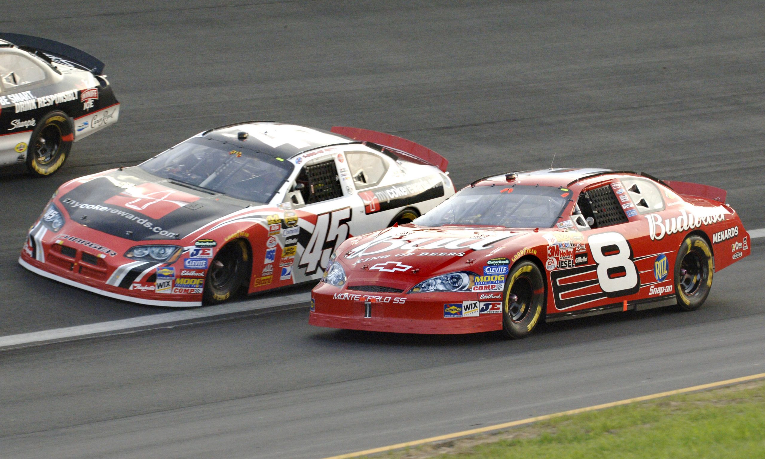 Kyle Petty (45) runs fender to fender with Dale Earnhardt Jr. in 2006.
