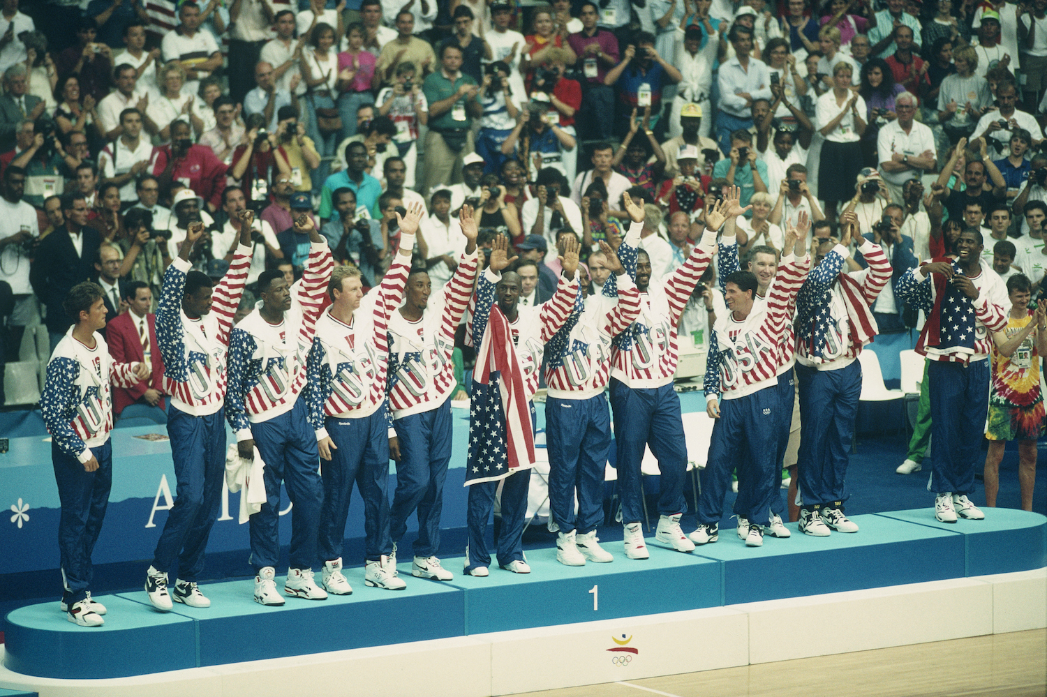 Larry Bird and the Dream Team receive gold medals at the 1992 Summer Olympics in Barcelona.