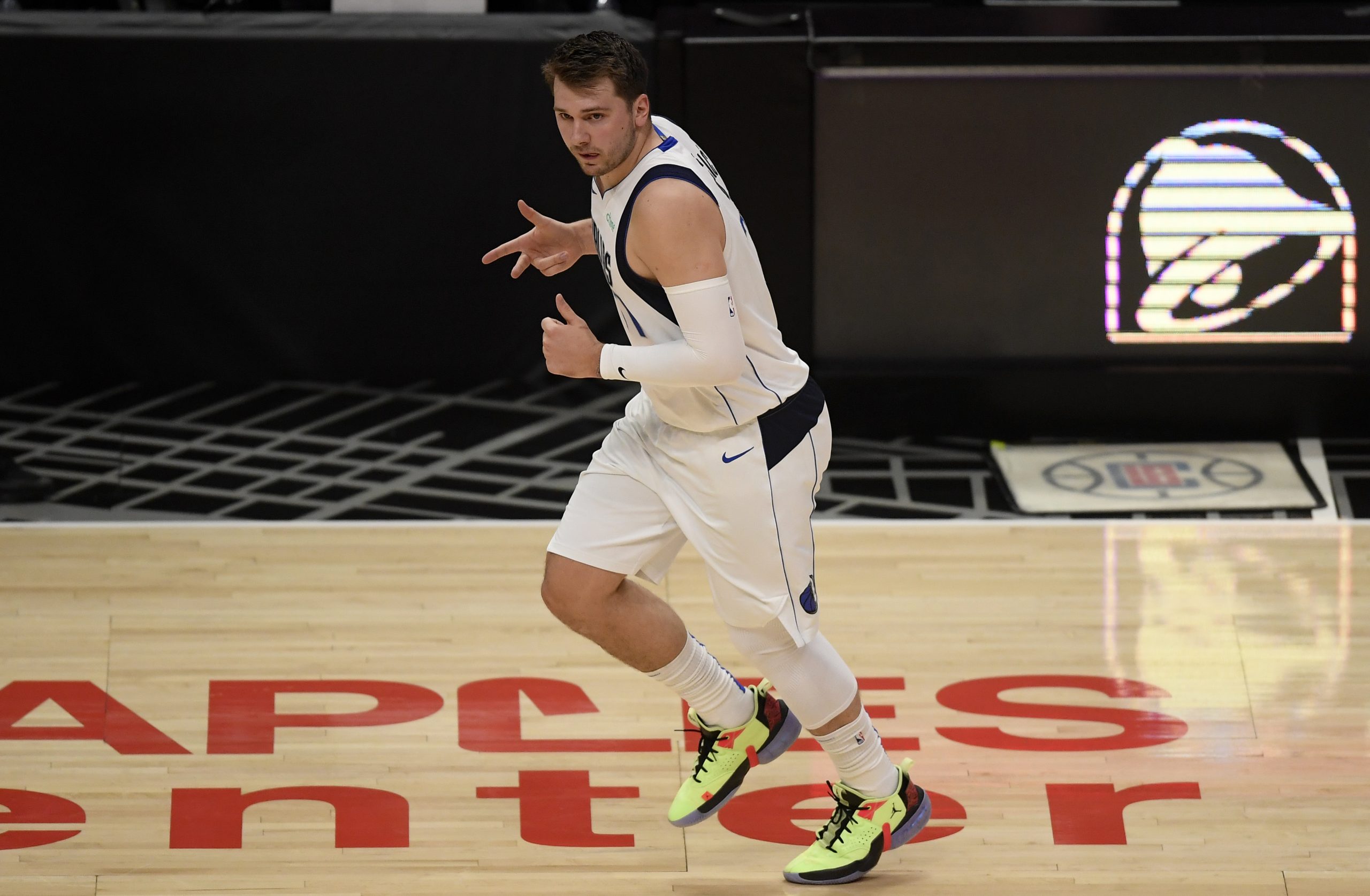 Luka Doncic runs up the floor in a playoff game against the Los Angeles Clippers