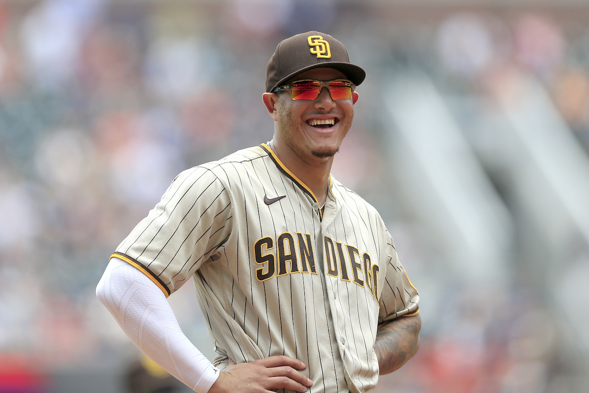 Manny Machado of the San Diego Padres smiles during the first game of the MLB doubleheader between the Padres and Atlanta Braves