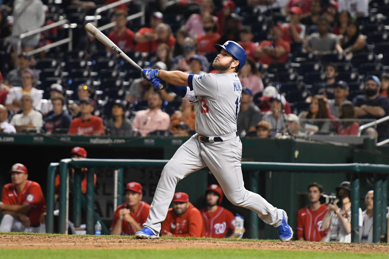 Max Muncy takes a swing during a game against the Washington Nationals.