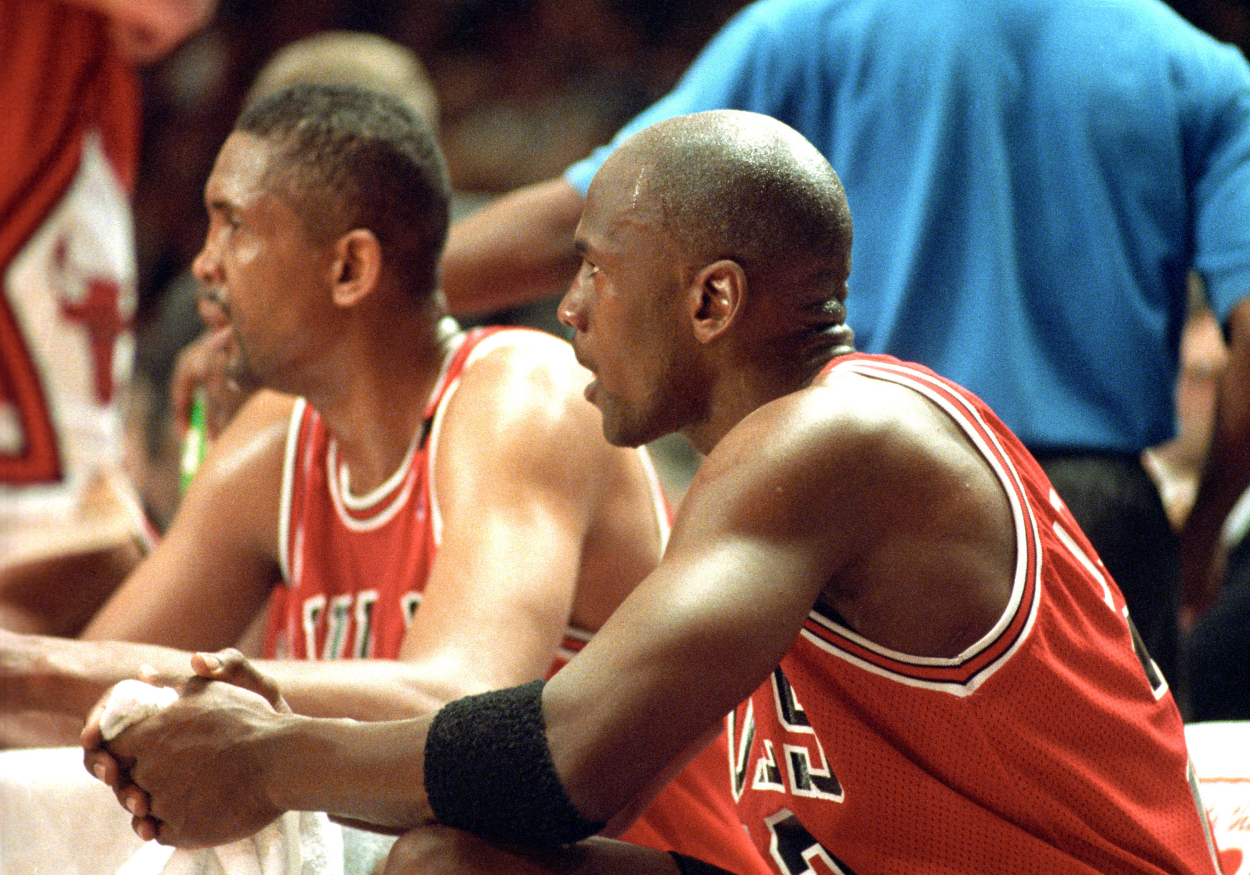 The Chicago Bulls Michael Jordan, left, Bill Cartwright, center