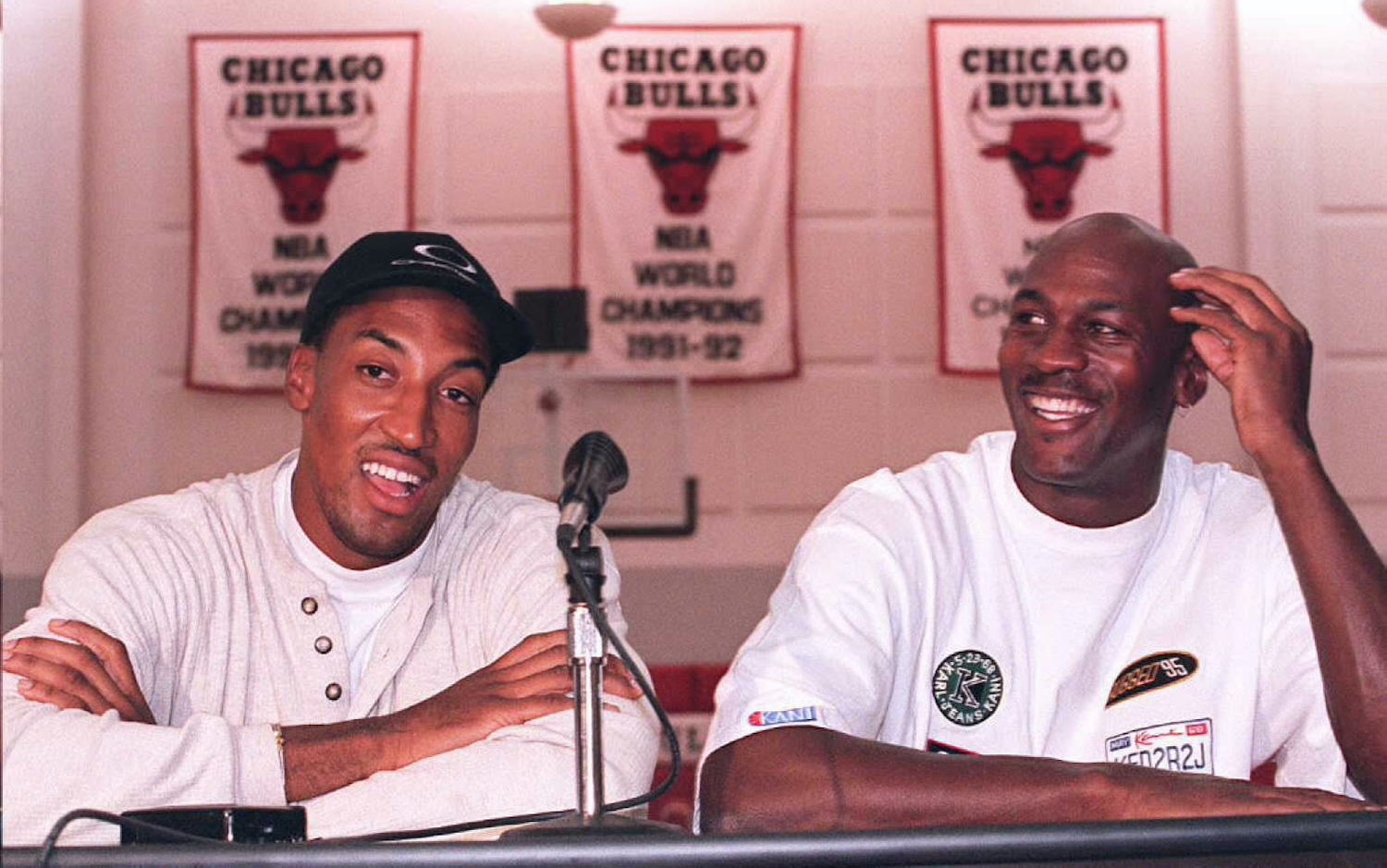 Michael Jordan and Scottie Pippen sit together at a Chicago Bulls press conference.