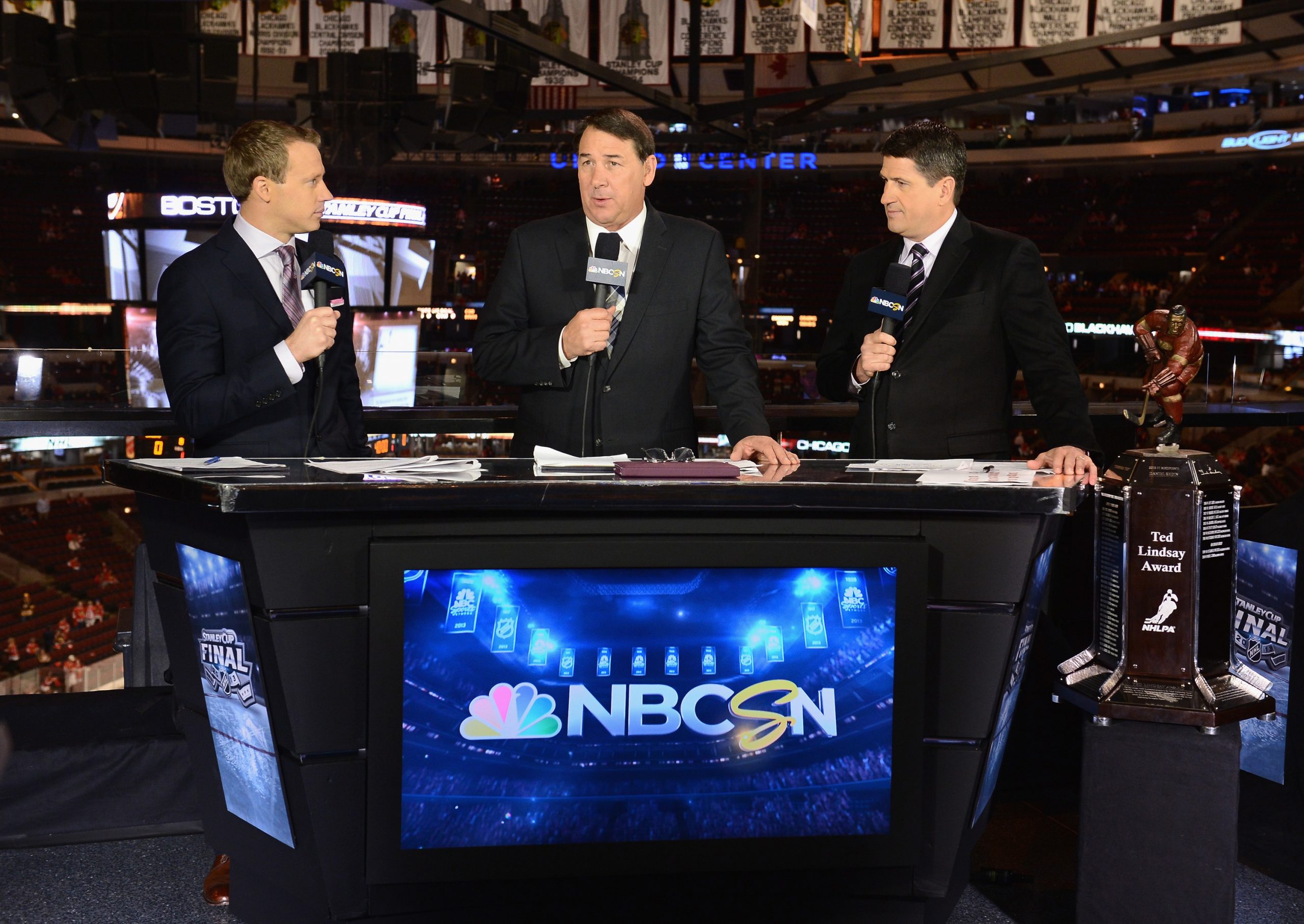 (L-R) NBC hockey analysts Liam McHugh, Mike Milbury and Keith Jones discuss Game 2 of the 2013 Stanley Cup Final.