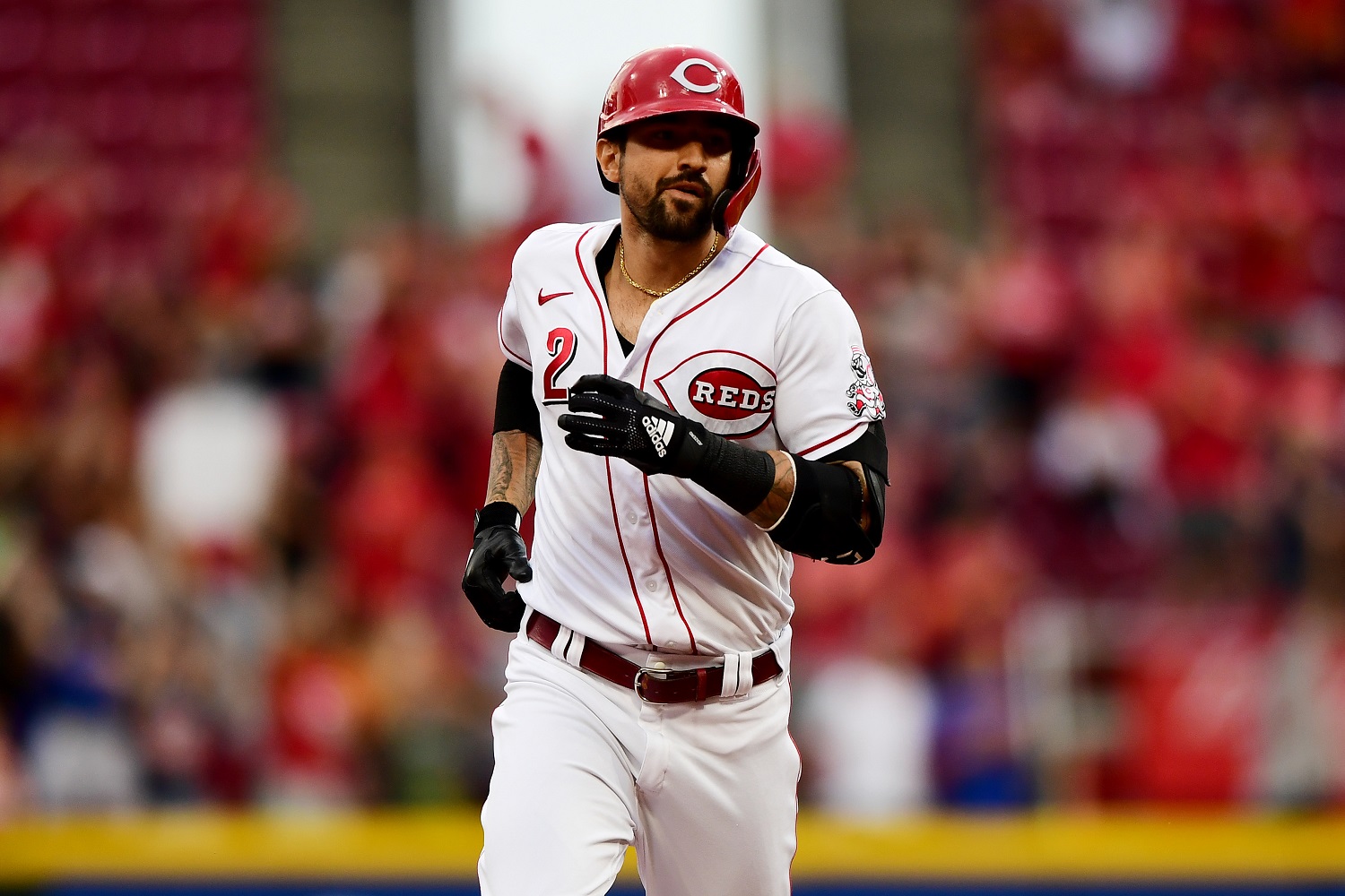 Nick Castellanos of the Cincinnati Reds circles the bases after hitting a three-run home run against the San Diego Padres at Great American Ball Park on June 30, 2021.