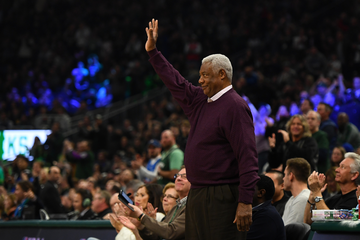 Oscar Robertson waves to the crowd in Milwaukee.