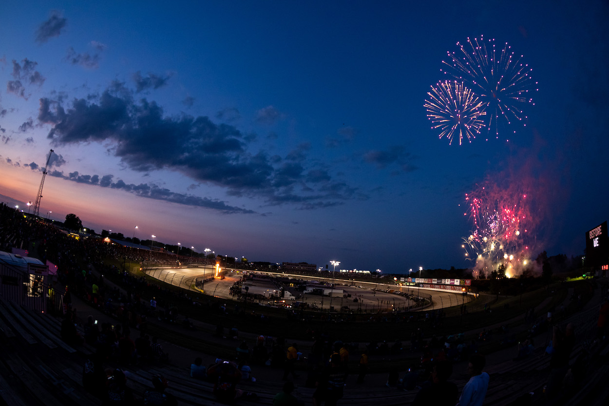 Local race track at night with fireworks