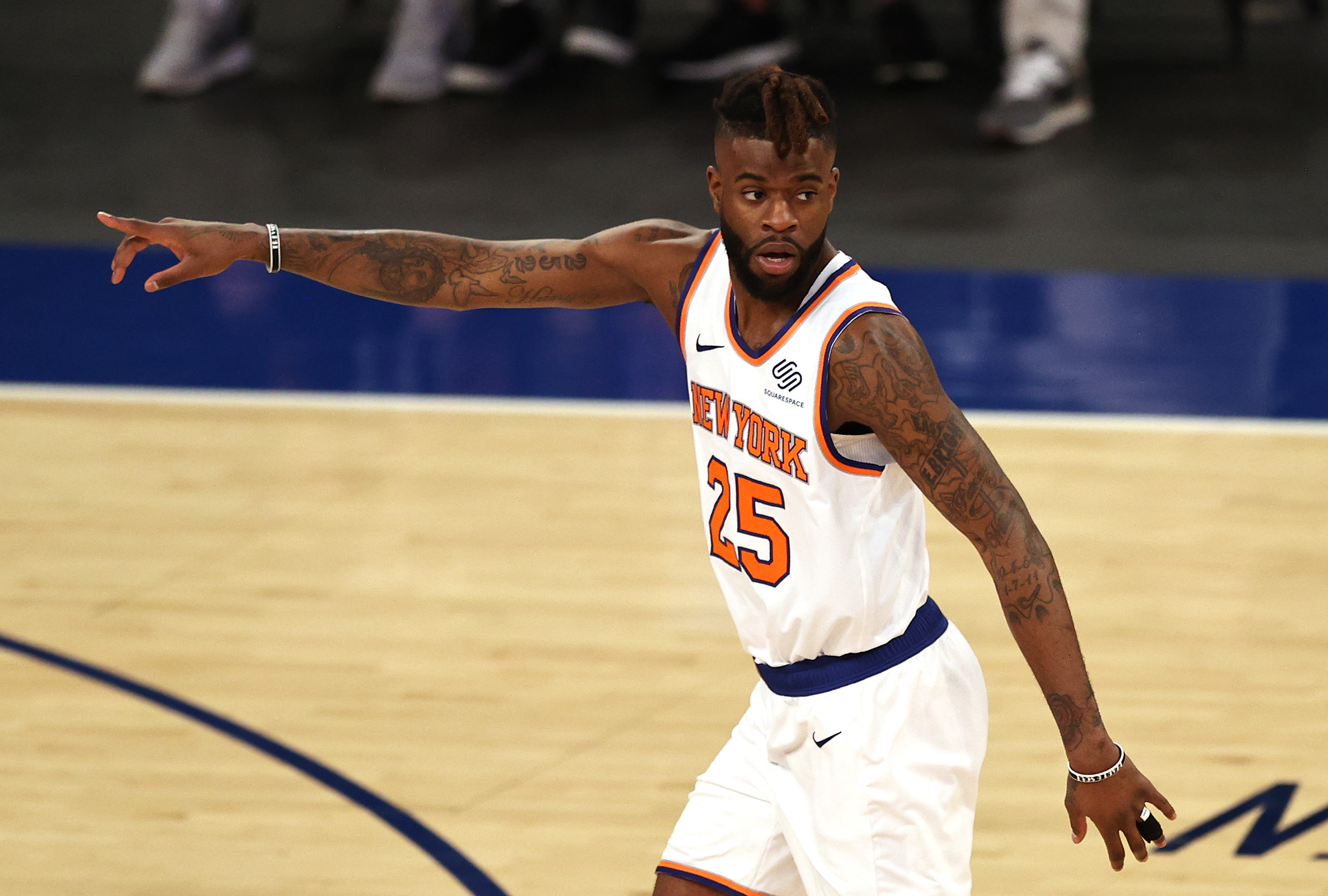 Reggie Bullock points during a New York Knicks playoff game