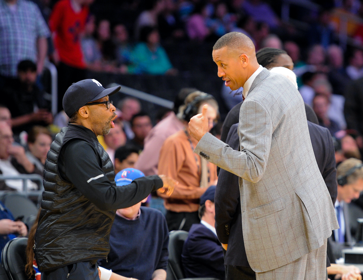 Spike Lee (L) and Reggie Miller attend a basketball game between the Los Angeles Clipers and the Los Angeles Lakers at Staples Center on March 6, 2014 in Los Angeles, California.