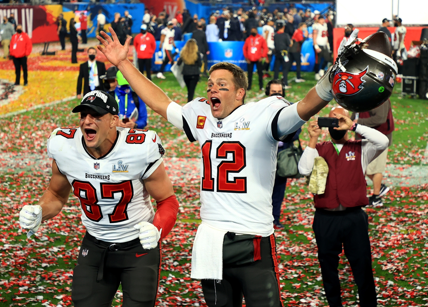 Tampa Bay Buccaneers teammates Rob Gronkowski and Tom Brady celebrate winning Super Bowl 55.