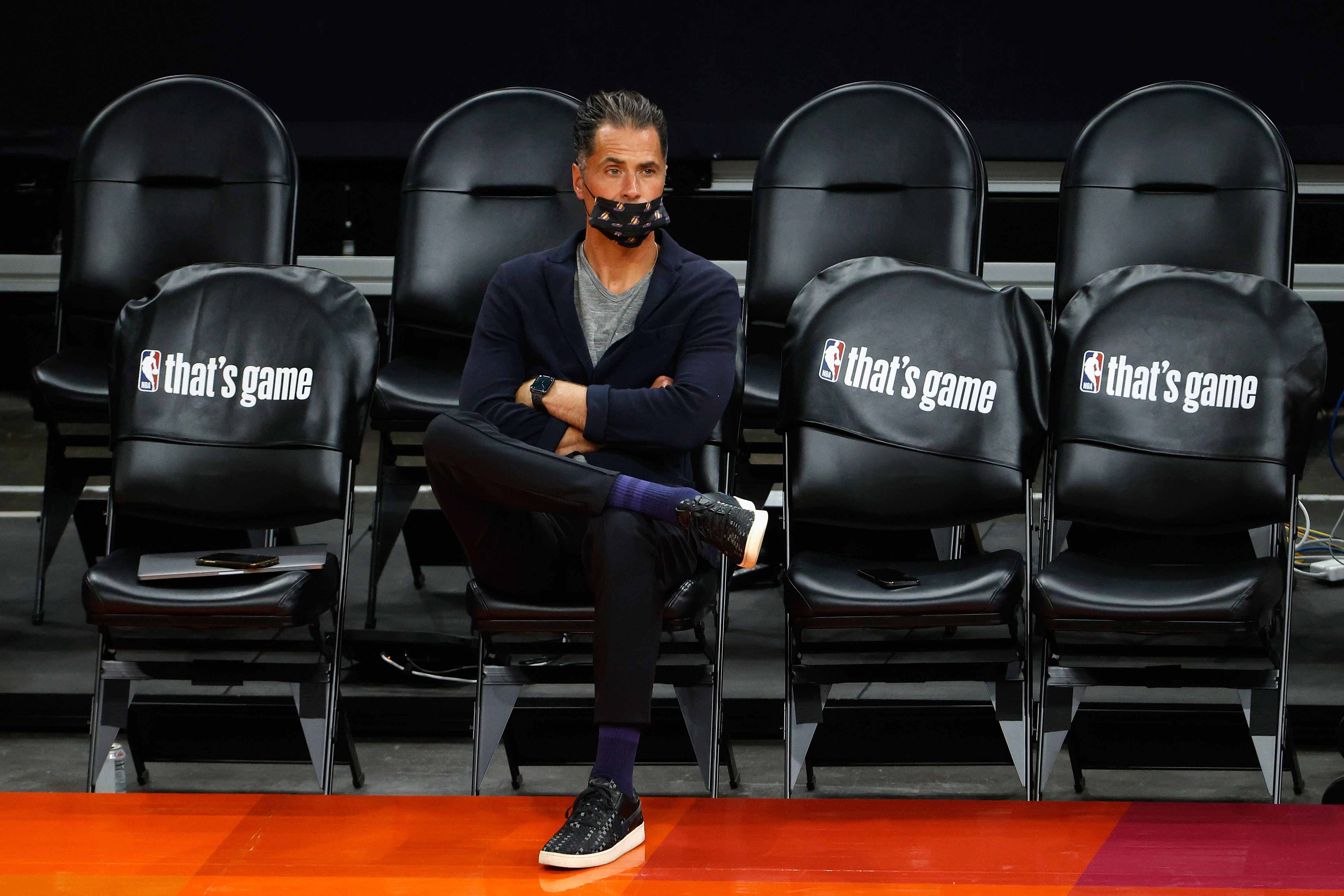 Los Angeles Lakers general manager Rob Pelinka watches a playoff game against the Phoenix Suns